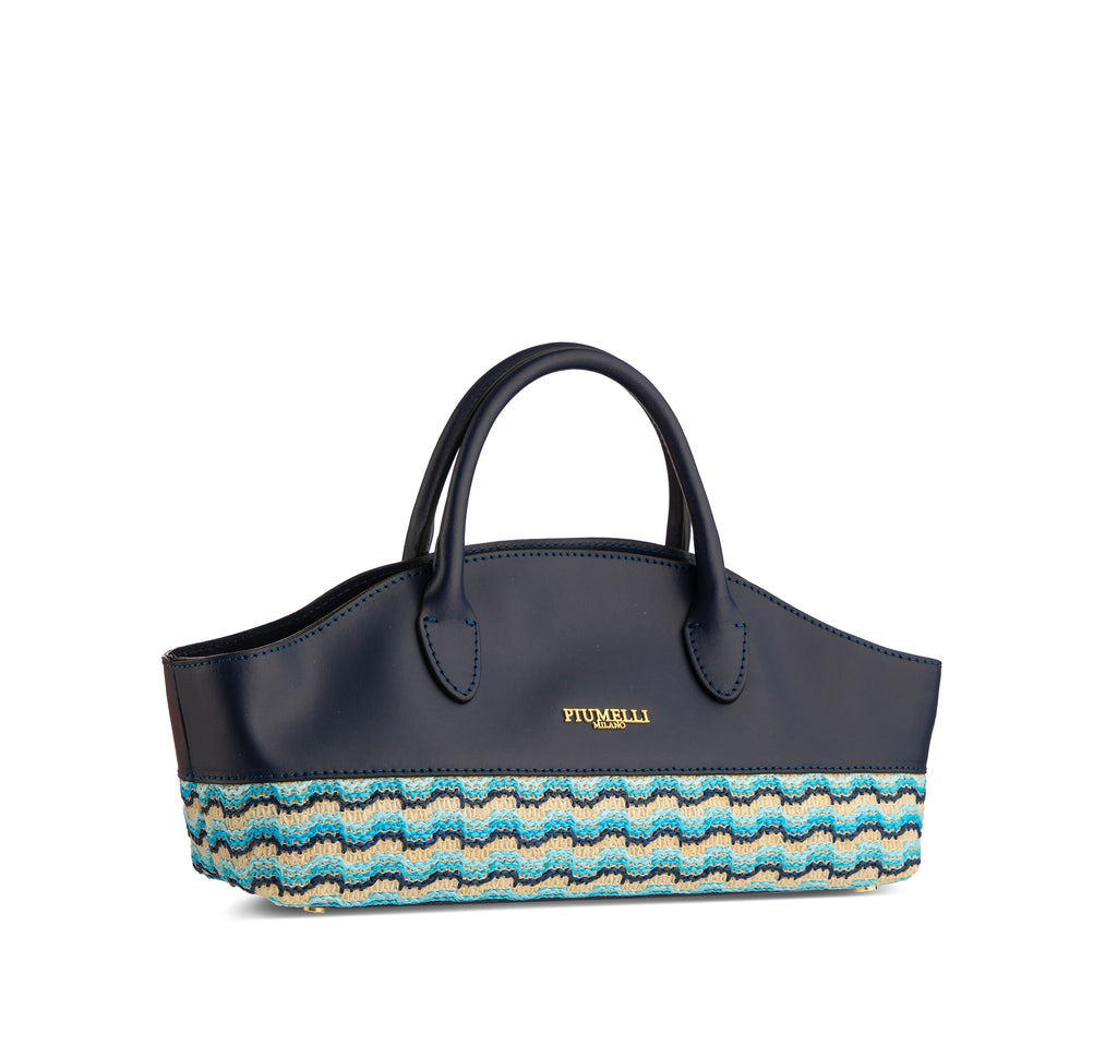 Piumelli Vela waves medium