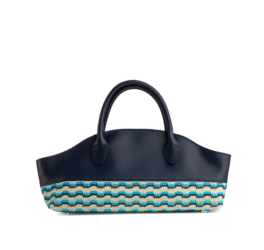 Piumelli Vela waves medium