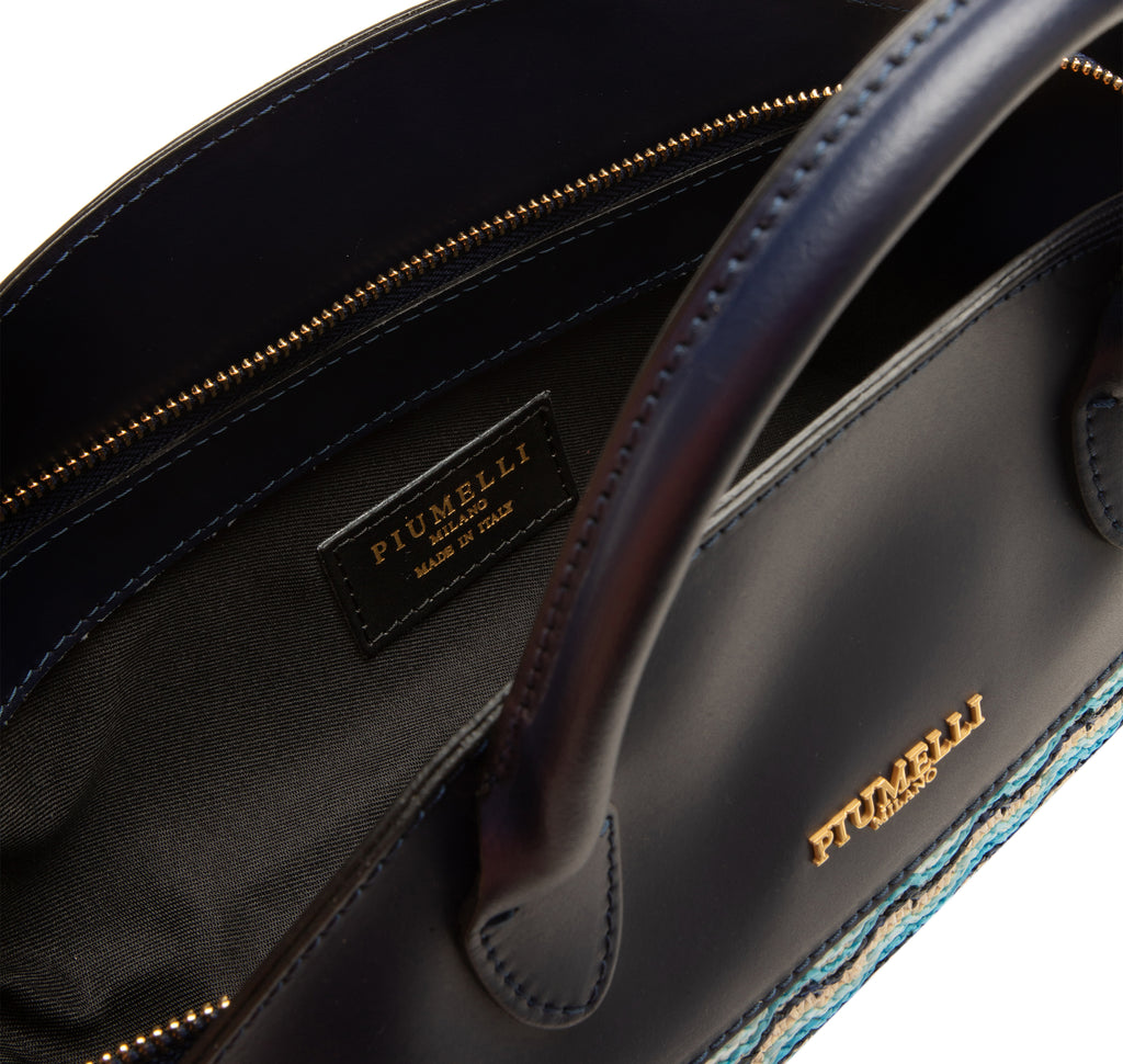 Piumelli Vela waves medium
